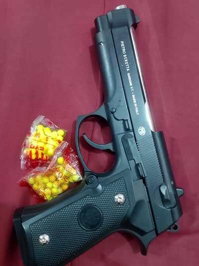 Toy metal gun