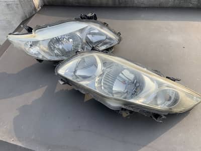 2010 model corolla geniune Headlights