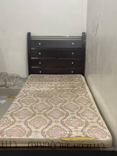 Bed with mattress