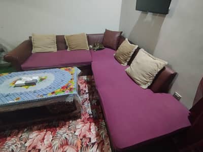 L shape sofa with center table