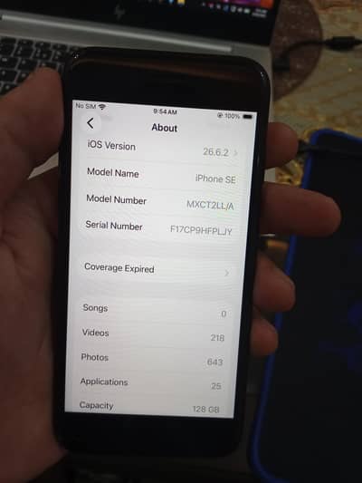 Apple iPhone SE everything is working well with 128 gb storage and 85%