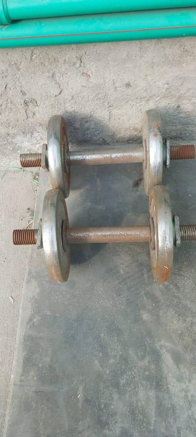 Dumbbells for sale 5 KG each  pair