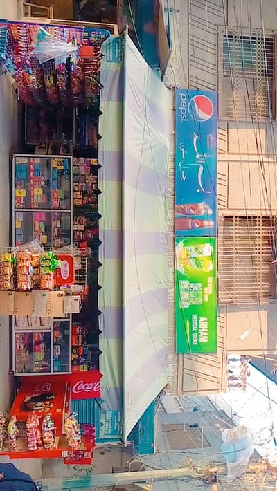 Green & white shop shade /canopy available