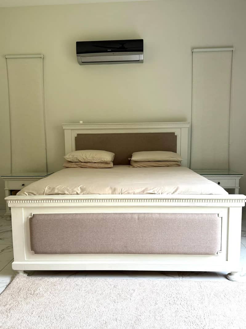 Solid wood , king size bed with two side tables. 1