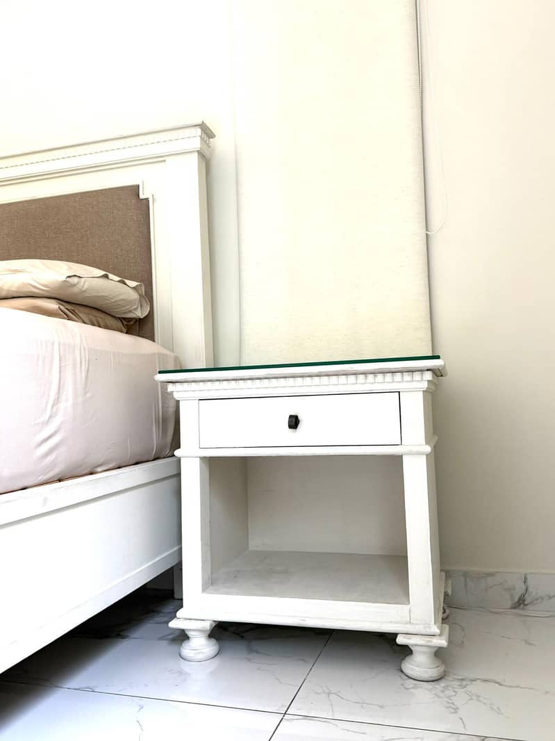 Solid wood , king size bed with two side tables. 2