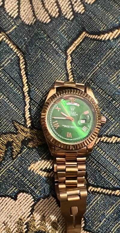 2 Rolex watches Daytona automatic and daydate