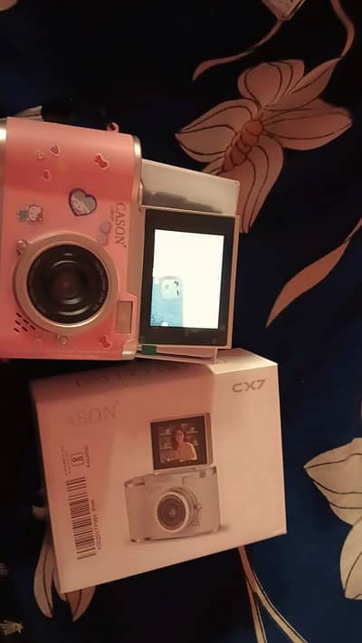  **DIGICAMS UNDER Rs. 3,000 **  ౨ৎ capture your little moments i