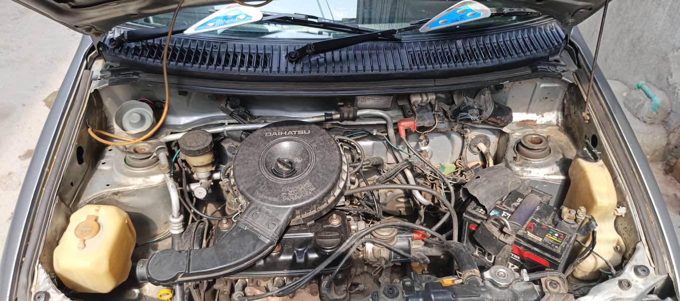 Daihatsu Cuore 2012 - Cars - 1120277882