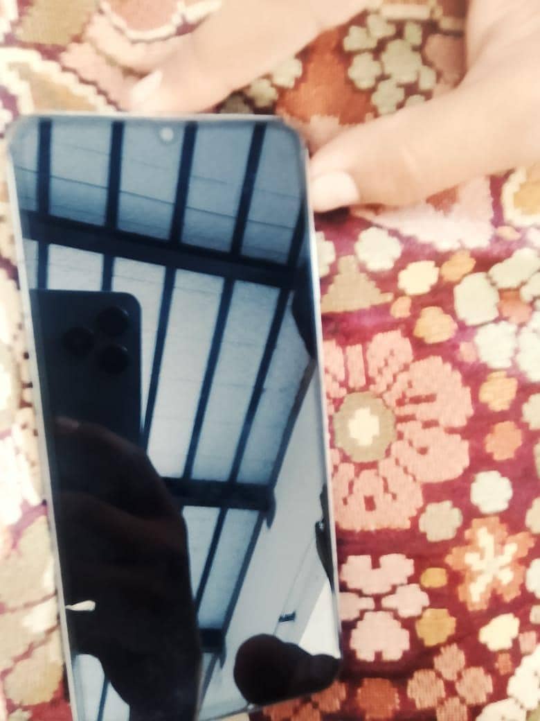 Samsung Mobile A06 0