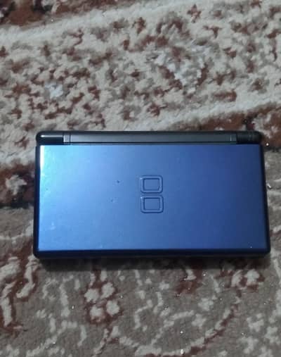 Nintendo DS Lite with games and carrying case
