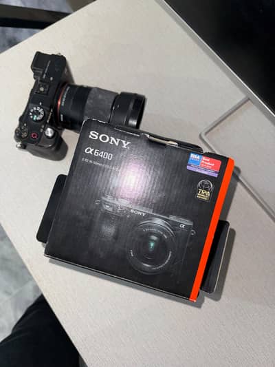 Sony a6400 with sigma 30mm 1.4 lens - 180k for both