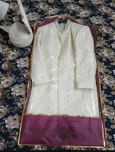 Sherwani with bracelet and Qullah