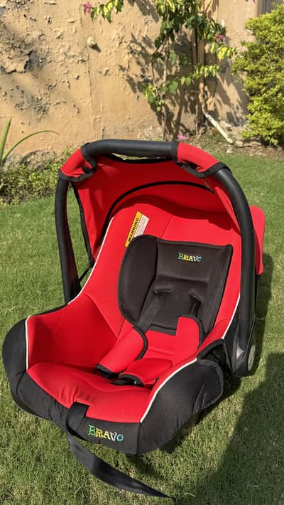 Bravo Baby Carry Cot / Car Seat   (Red & Black) - Excellent Condition
