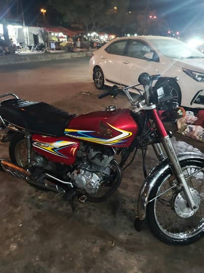 Honda CD 70 red and black colour