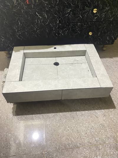 Solid tile washroom sink venty