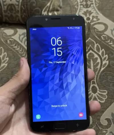 Samsung Mobile J4.       only mobile
