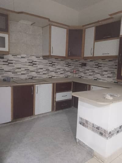 Renovated 2 bed drawing lounge ground floor portion for rent tiled washrooms American kitchen 24 hours water and electricity separate gate and meters