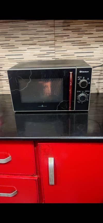 Dawlance 23 liter microwave perfect working no repair no fault