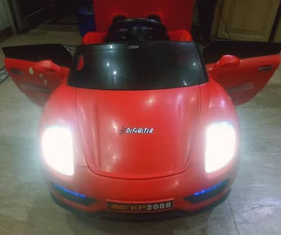 IMPORTED KIDS CAR with REMOTECONTROL & OPERABLE DOORS / All ok
