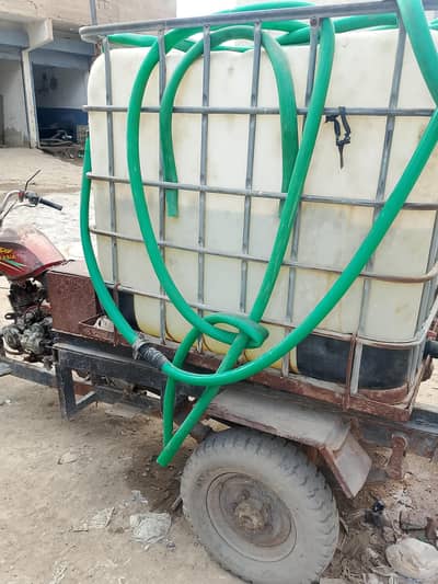 loader rickshaw with water Tanki and generator