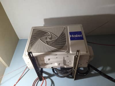 haier 1 ton 6 month used 75000 5 yeairs full claim warainty