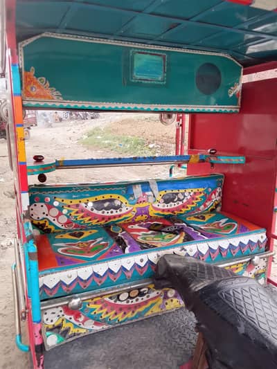 united 100 riksha