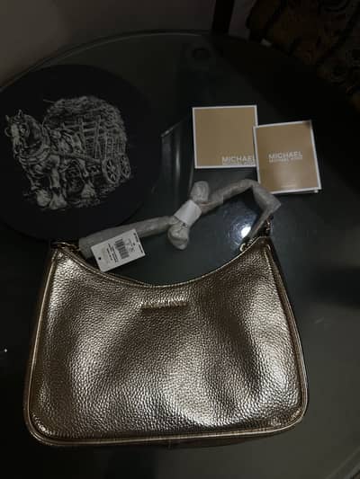 Micheal Kors Jet Set Travel Crossbody Pale Gold