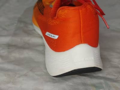 Orange & Yellow Sports Running Shoes – Bold Design & Lightweight Look