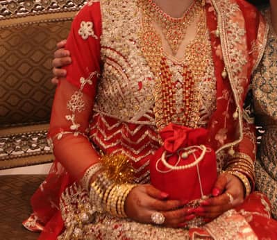 bridal dress colour red/ one time used h condition 10/10