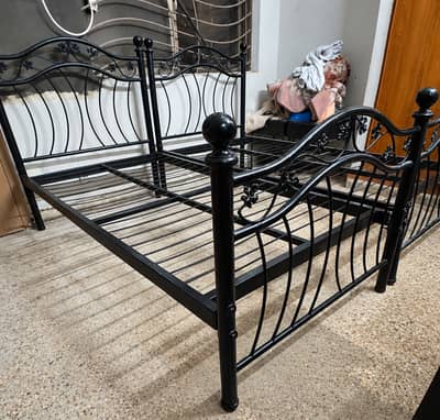 Two Single beds with 2 side tables