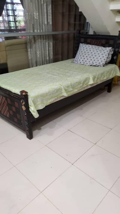 Single wooden bed