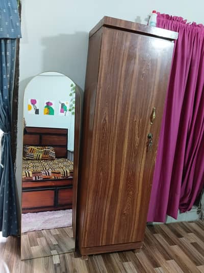 single bed with mattress and single cupbourd