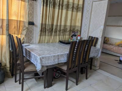 interwood heavy glass dining table avaialble for sell
