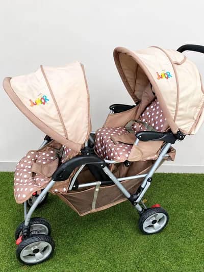 junior twin stroller available slightly used. . . just like a new