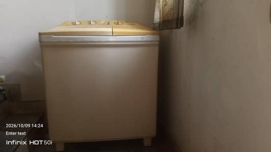 washing machine with attached spiner