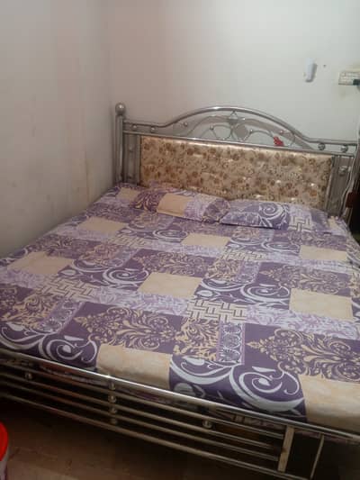 King size bed with mattress steel and iron.
