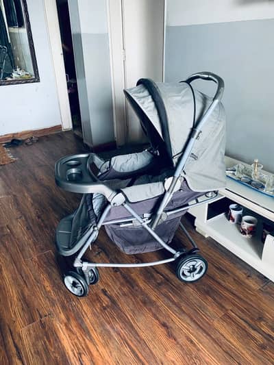 imported 2 in 1 pram/ stroller in excellent condition. rocker system