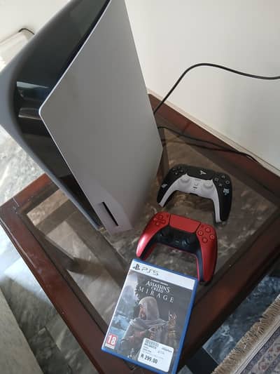 ps5 origional disc addition with 2 controllers and one disc