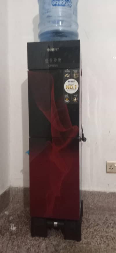 Orient dispenser and refrigerator good condition 10 by 10