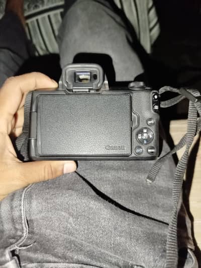 Canon m50 with 50mm stm lense and Viltrox adapter