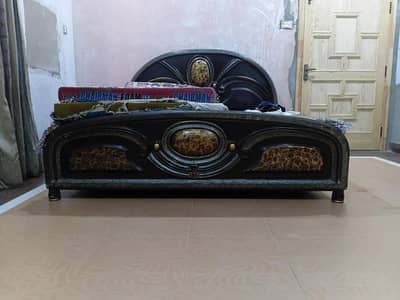 used double bed with side tables
