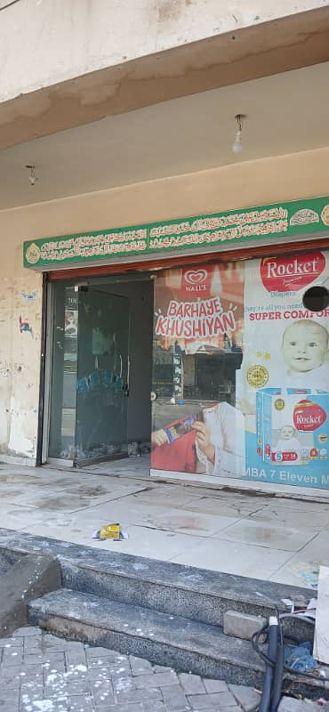 2 marla commercial Shop plus flat for sale Eden Orchard