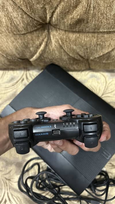 PlayStation 3 for sale with 2 controllers