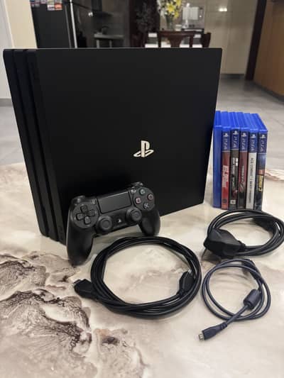 PS4 Pro 1TB Official + 5 Games CD + 1 Controller - 10/10 Condition