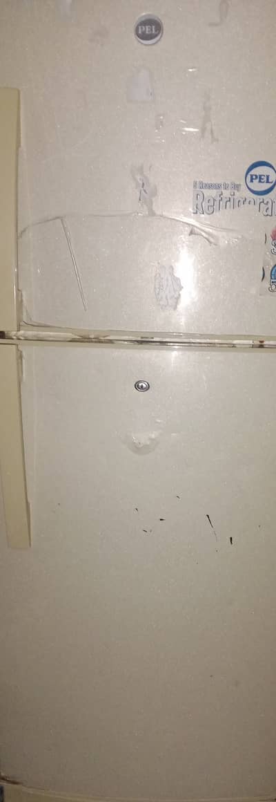 Refrigerator good condition medium size+staplizer 2500 watt