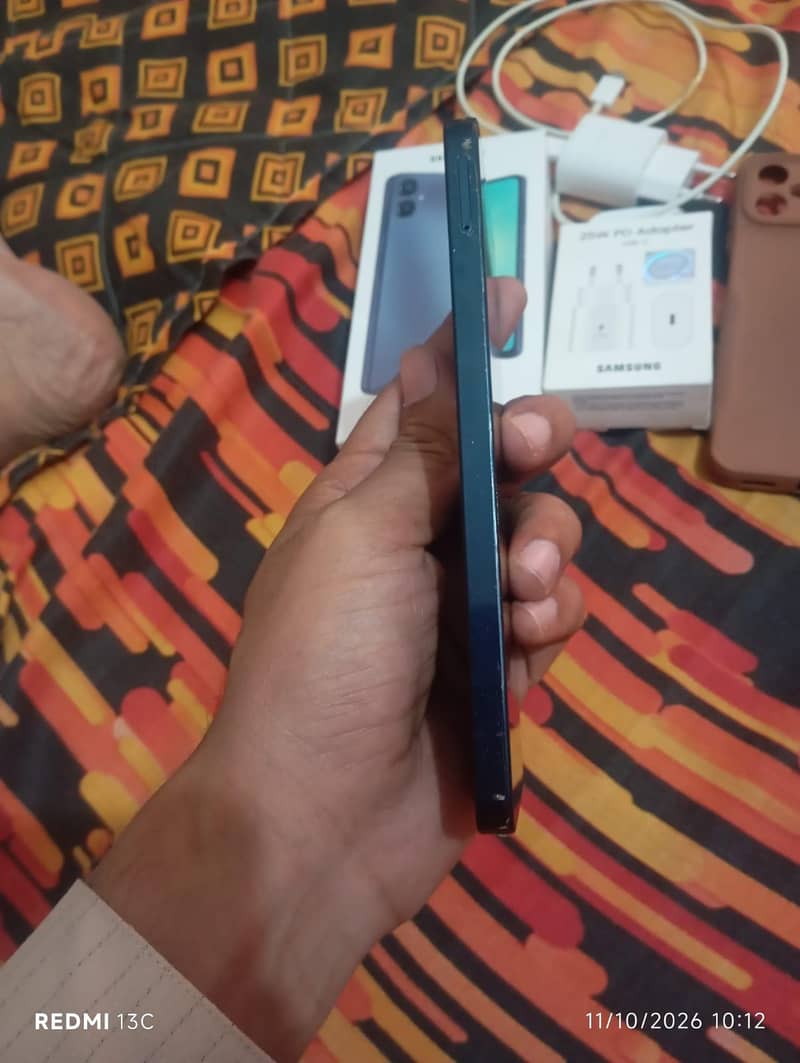 Samsung Mobile A06 1