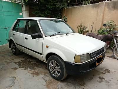 Rs. 3.25 Daihatsu Charade 1986 registered 1994.
