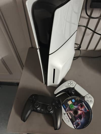 PS5 WITH 2 CONTROLLES AND TEKEN 8 FOR SALE
