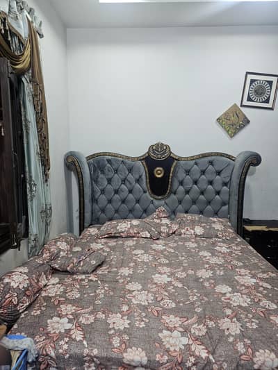 bed with singer maze and side table