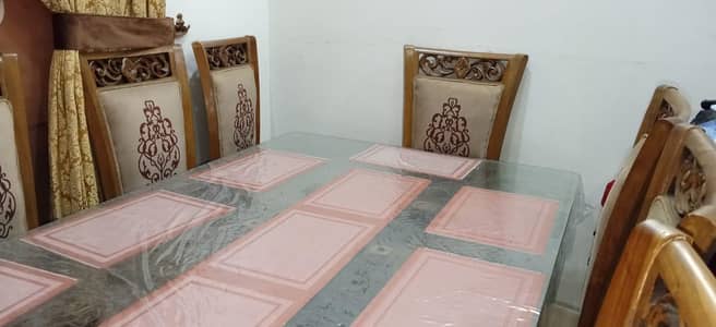 Solid wood 8 chairs Dinning table in brand new condition
